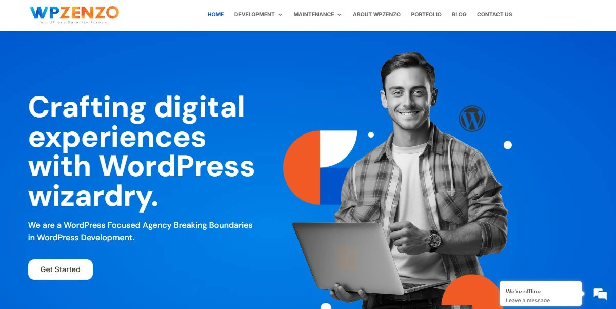 home page A homepage screenshot of WP Zenzo, a WordPress-focused agency. The design features a blue background with bold white text stating, "Crafting digital experiences with WordPress wizardry." A smiling man holding a laptop is positioned on the right side. The navigation menu at the top includes links for Home, Development, Maintenance, About WP Zenzo, Portfolio, Blog, and Contact Us. A "Get Started" button is visible, along with a chat widget indicating "We're offline." The page includes abstract design elements and the WordPress logo.